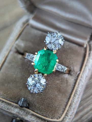 Mellerio GIA certed diamond and Colombian emerald ring