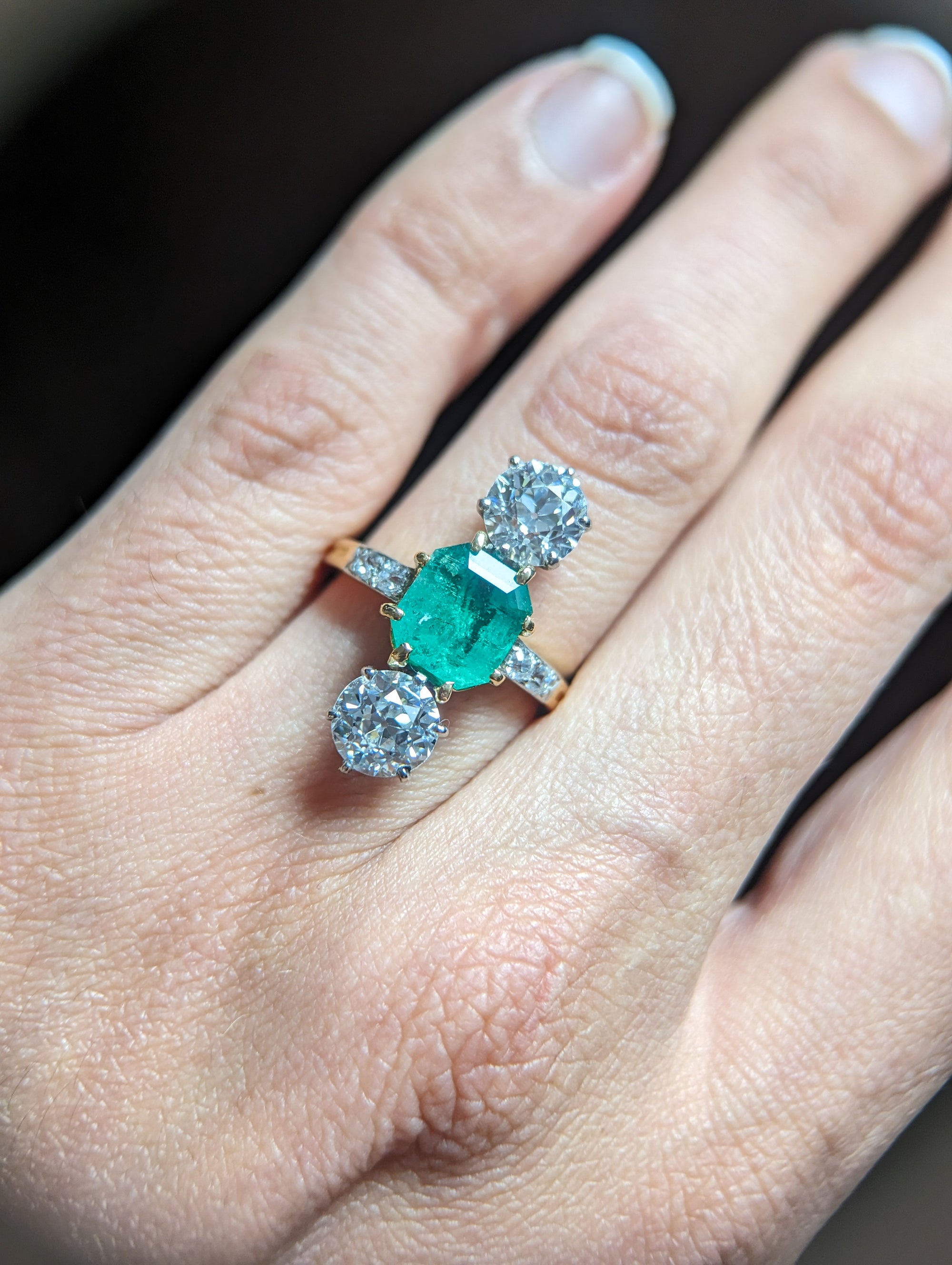 Mellerio GIA certed diamond and Colombian emerald ring