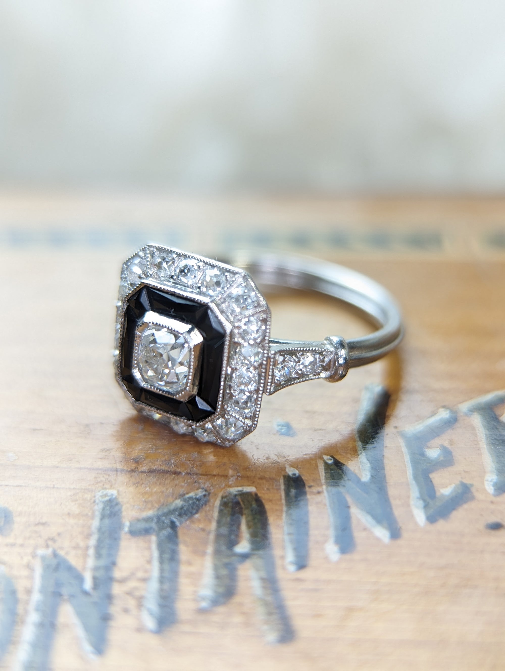 Antique style old cut diamond and onyx ring