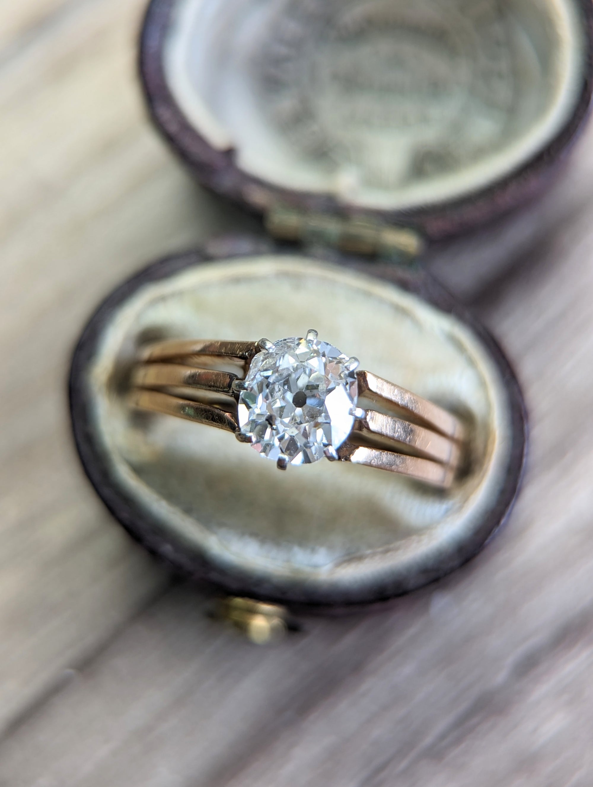 Antique mine cut solitaire diamond ring