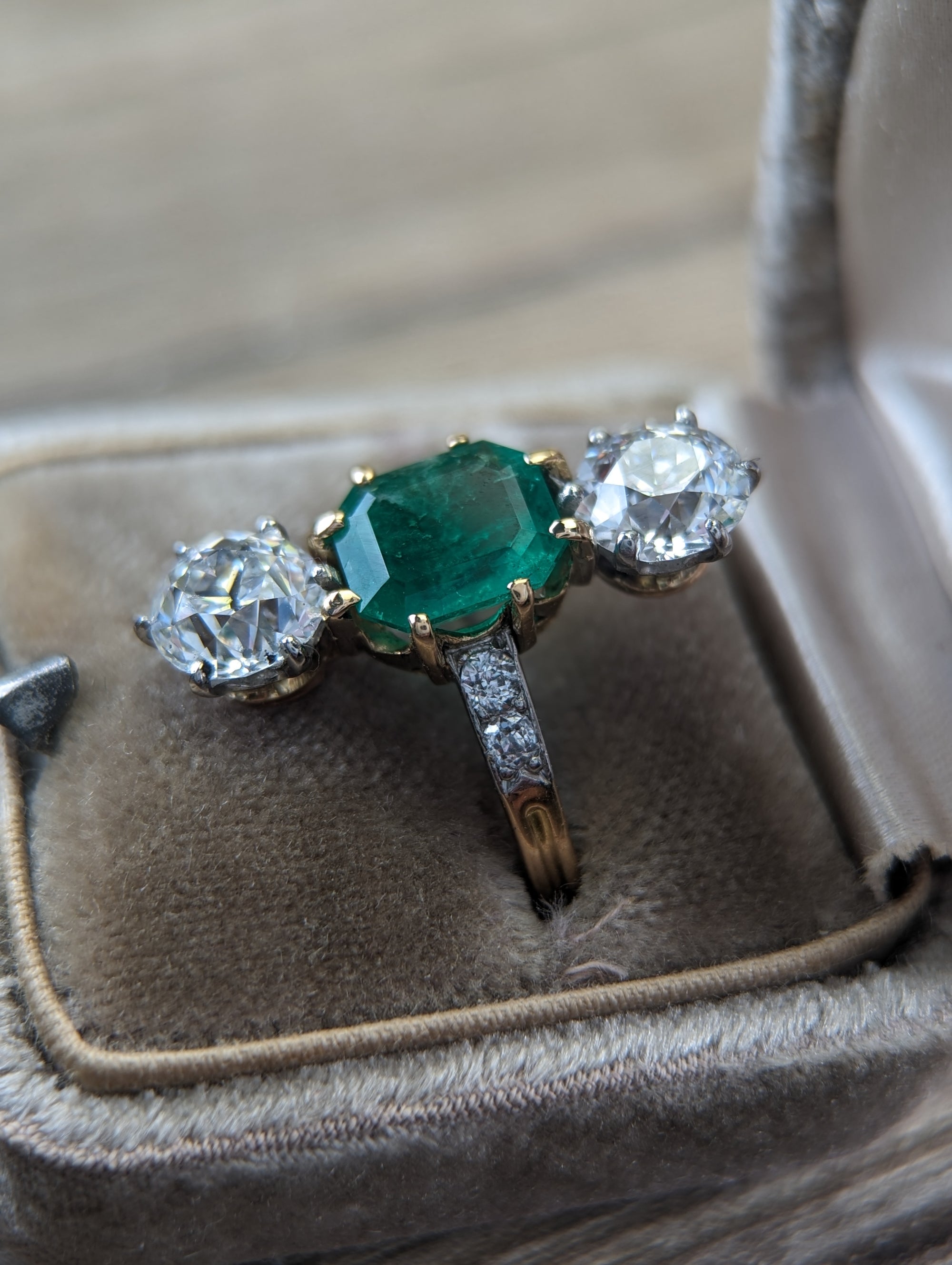 Mellerio GIA certed diamond and Colombian emerald ring