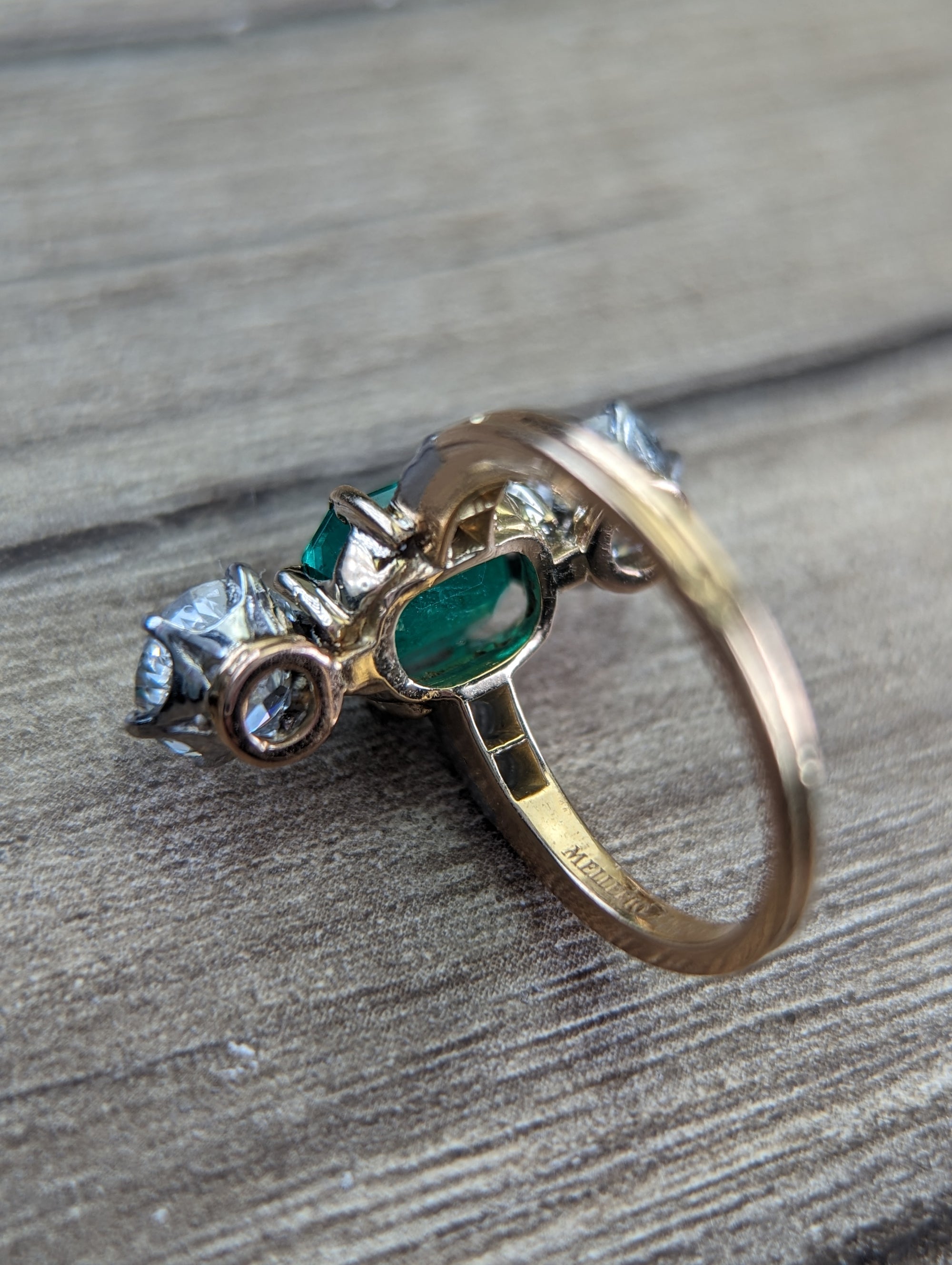 Mellerio GIA certed diamond and Colombian emerald ring
