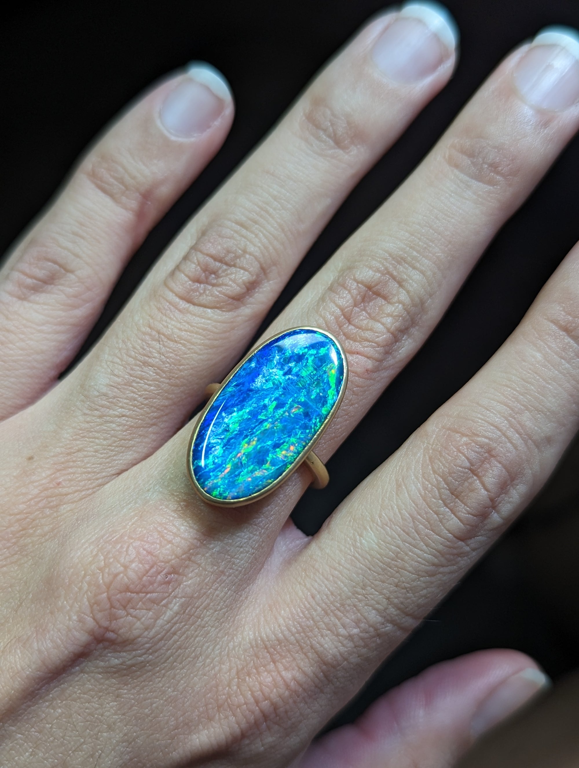 Opal and 18k gold ring