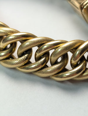 Heavy 18k yellow gold curb link bracelet