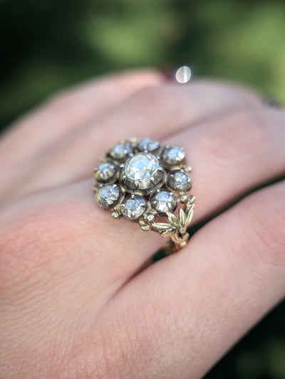 Close view of the vintage Dutch diamond cluster ring worn on the hand