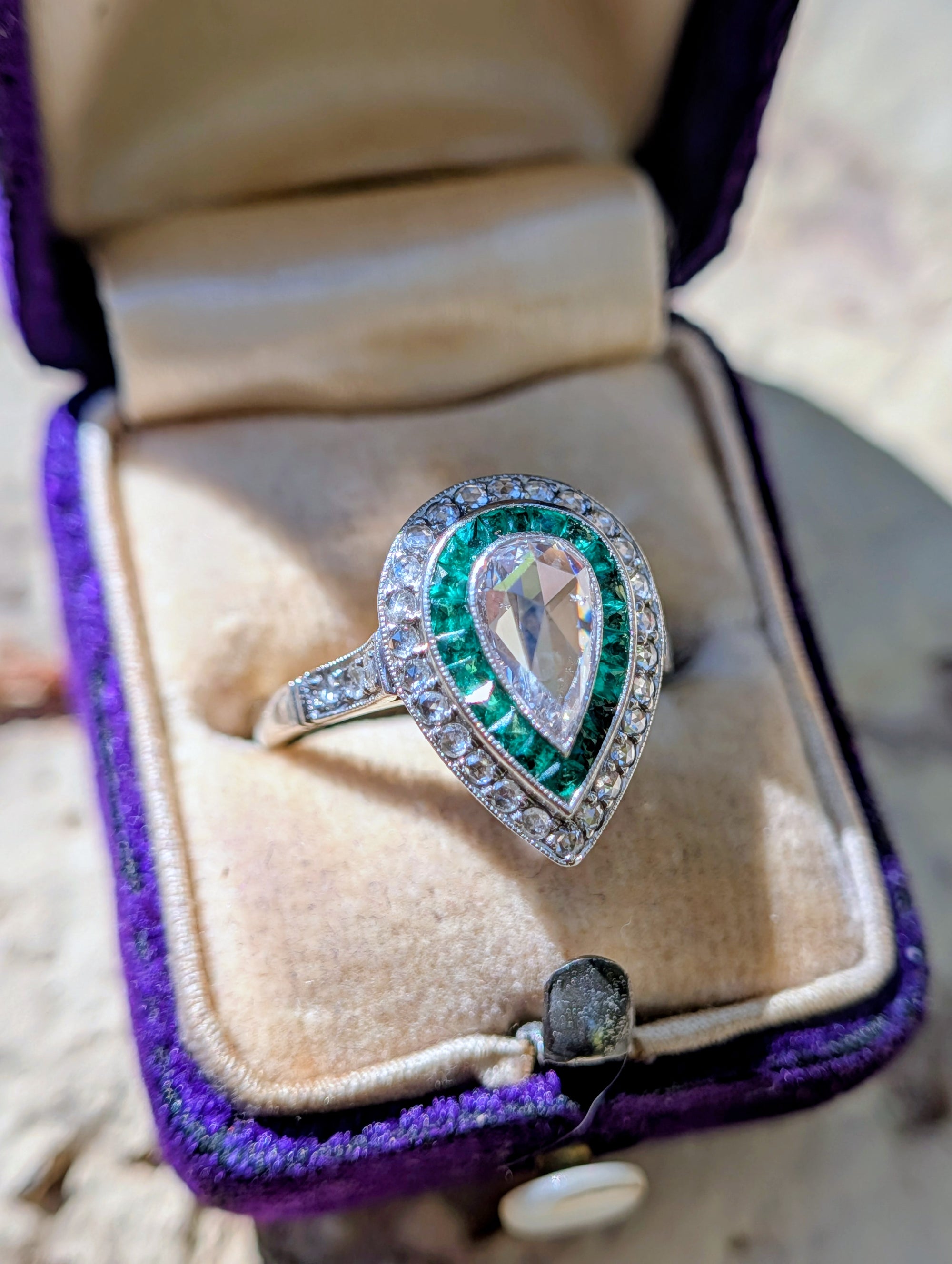 Pear rose-cut diamond and natural emerald ring in platinum