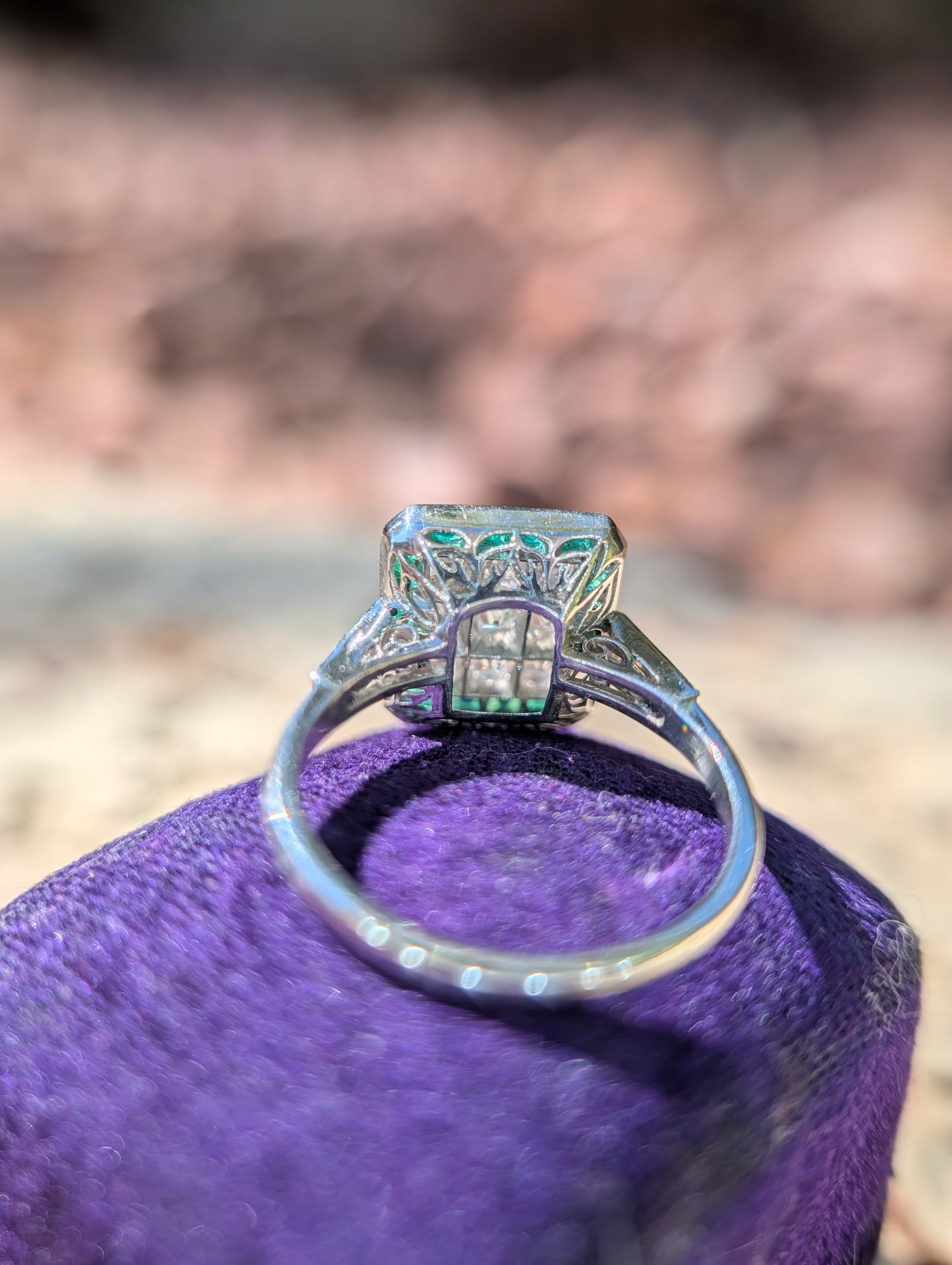 Underside of the platinum ring showing its detailed pierced gallery