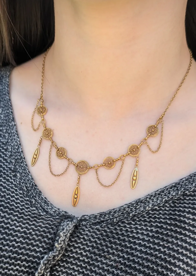 French 18K gold festoon necklace shown worn