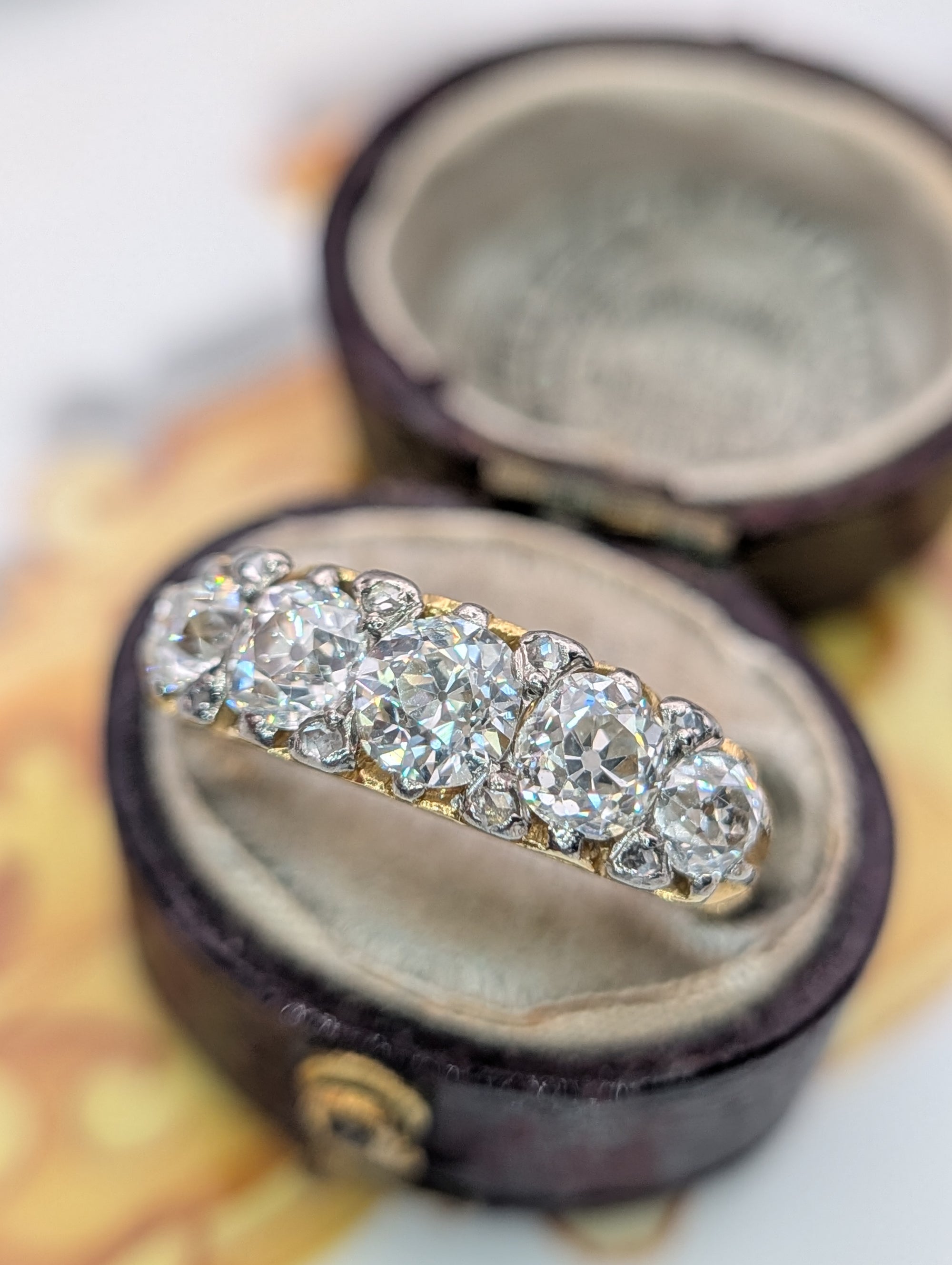Antique five diamond half hoop ring in 18 karat gold, front view