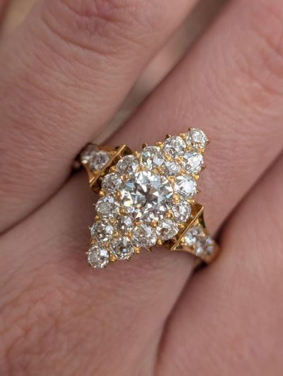 Antique diamond navette ring worn at an angle
