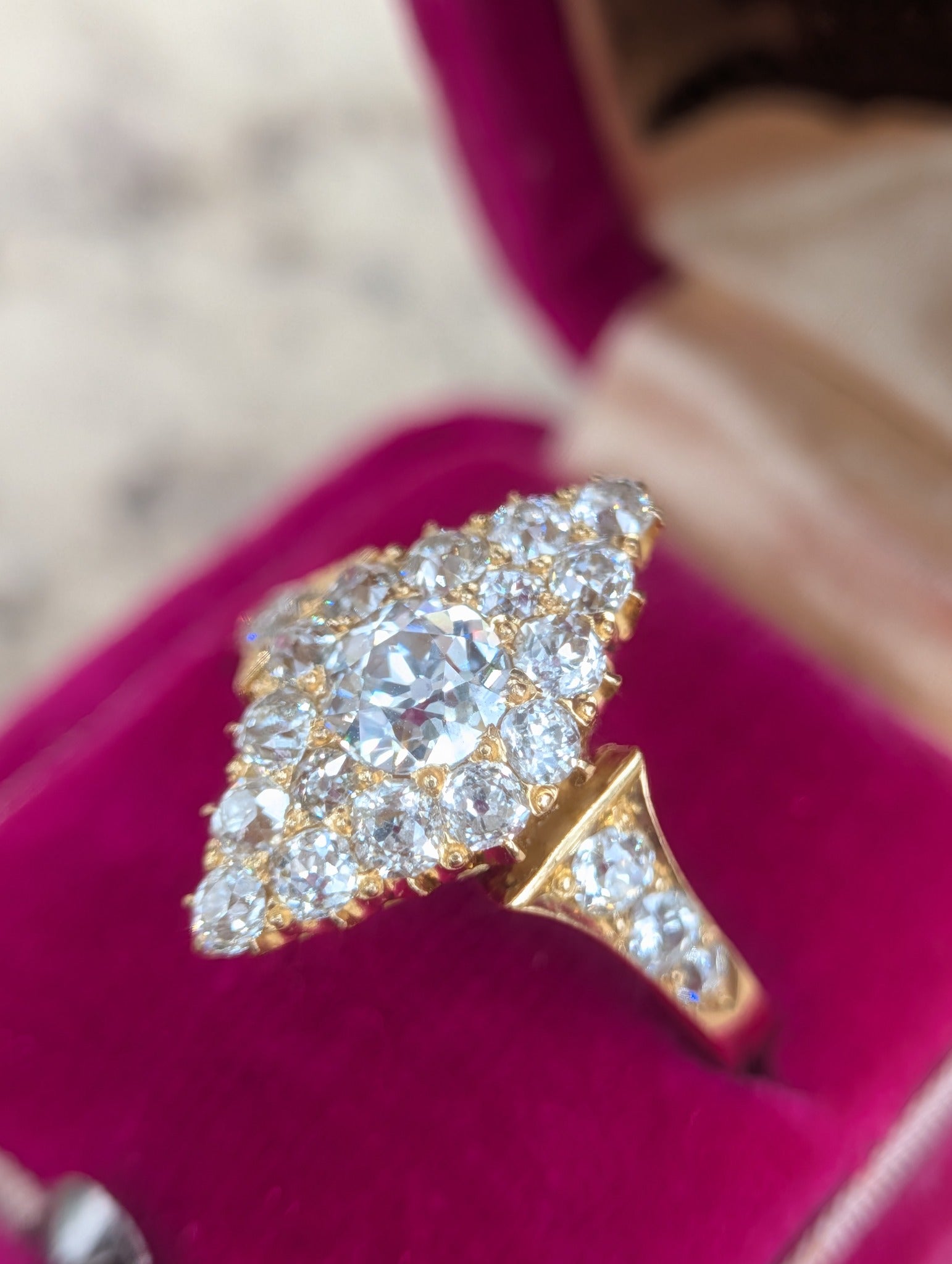 Antique diamond navette ring worn on hand