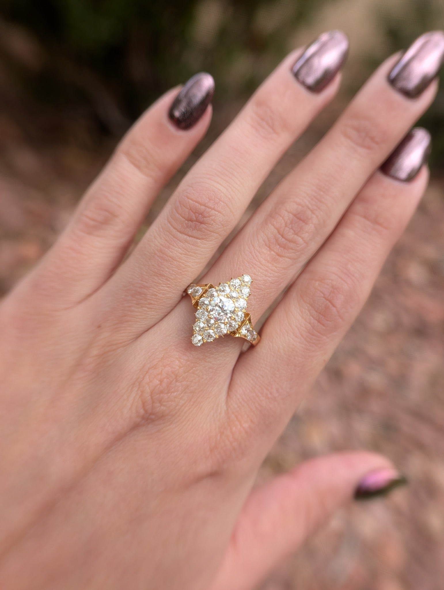 Side view showing tall diamond crowns and navette setting