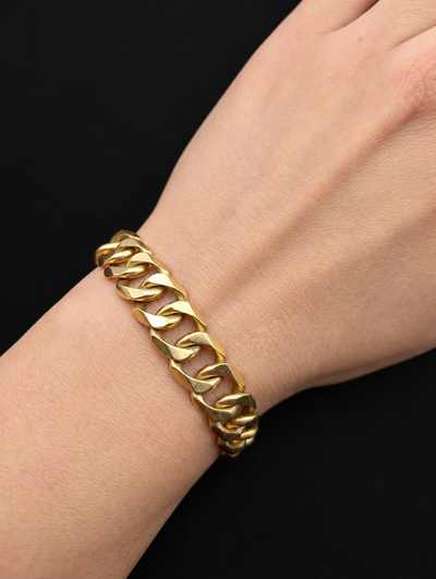 Vintage 18K gold geometric curb link bracelet — shown on wrist