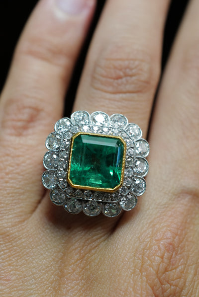 7CTW Vintage GIA certed  Colombian Emerald and diamond ring.