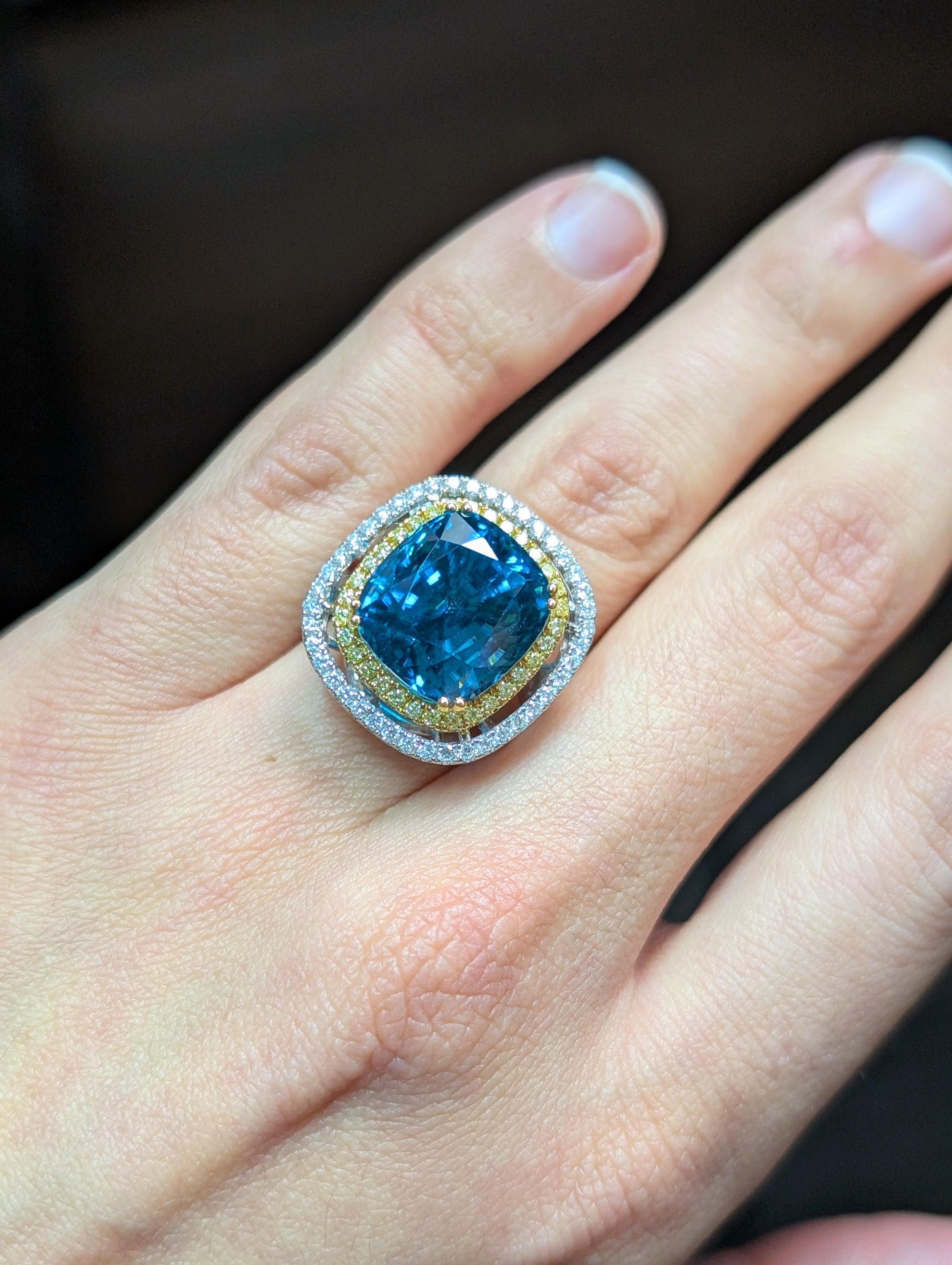 Blue zircon and diamond ring