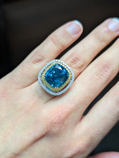 Blue zircon and diamond ring