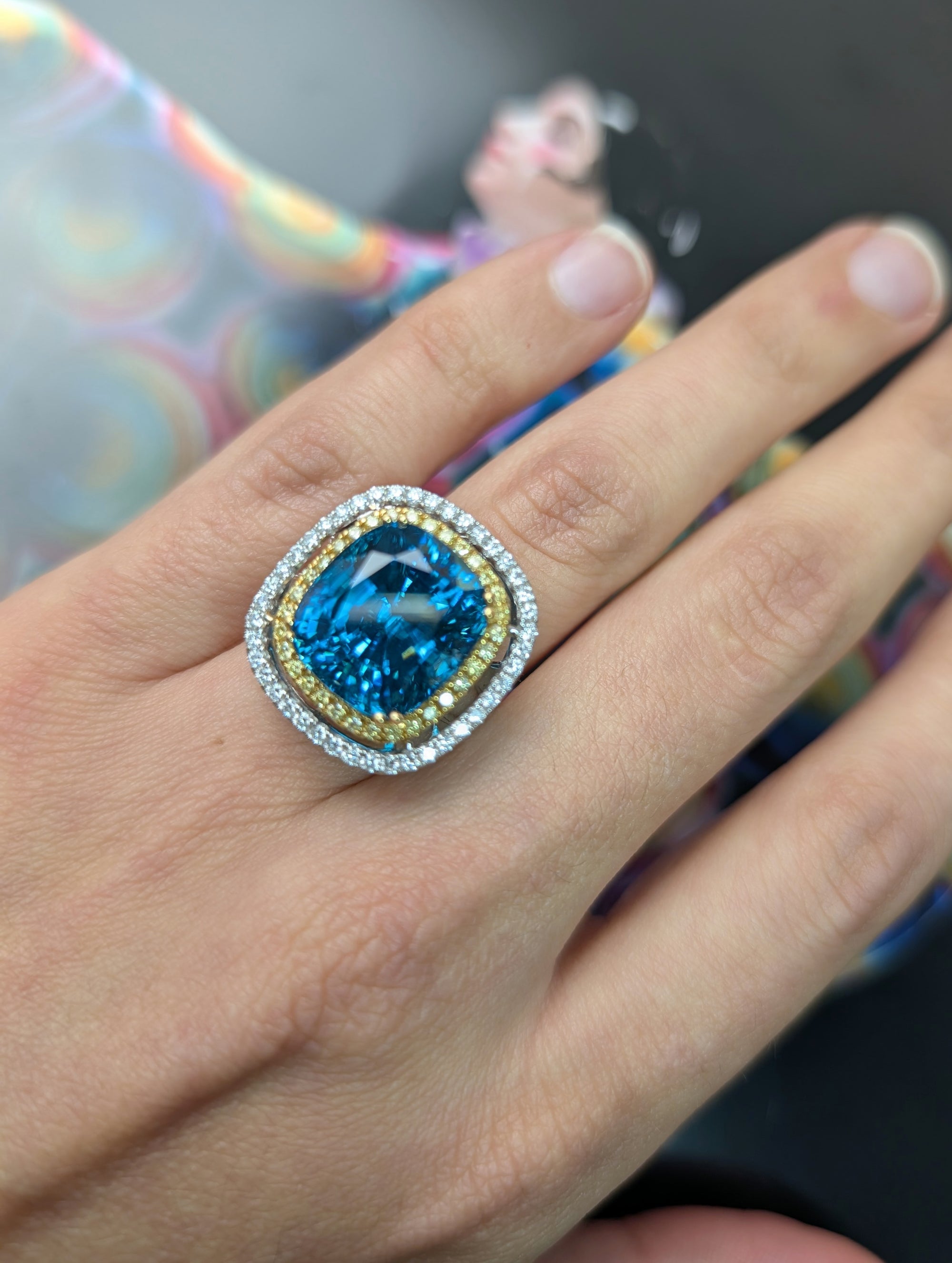 Blue zircon and diamond ring