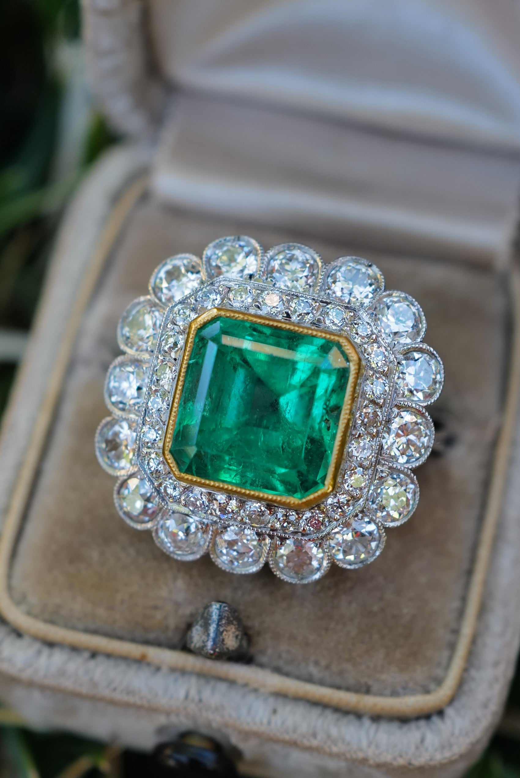 7CTW Vintage GIA certed  Colombian Emerald and diamond ring.
