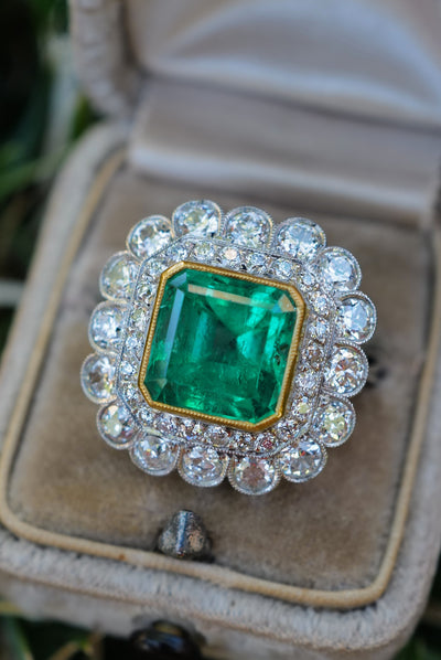 7CTW Vintage GIA certed  Colombian Emerald and diamond ring.