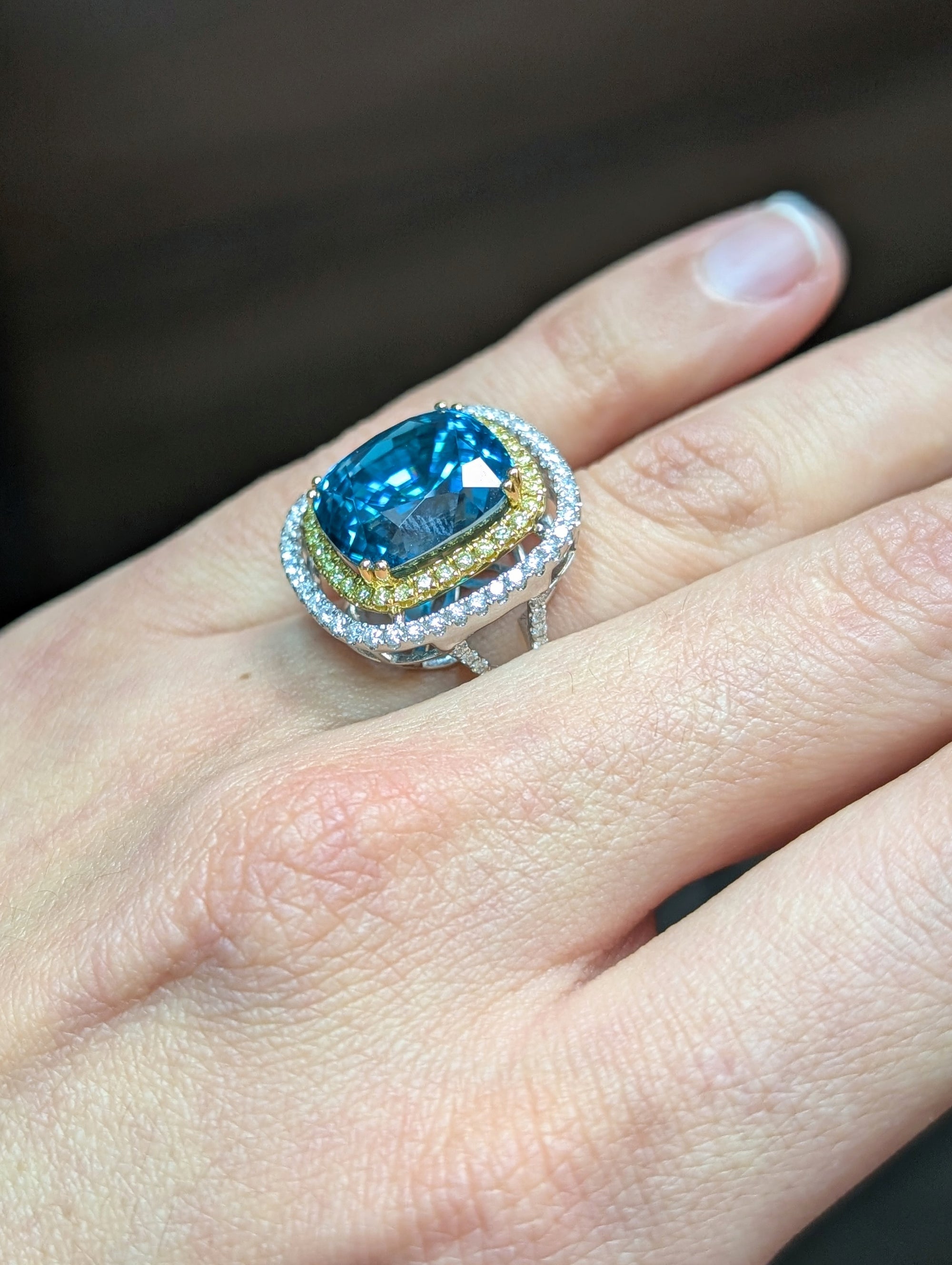 Blue zircon and diamond ring