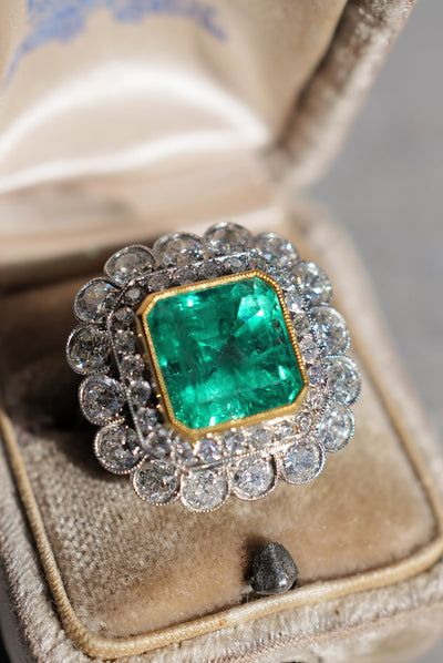 7CTW Vintage GIA certed  Colombian Emerald and diamond ring.