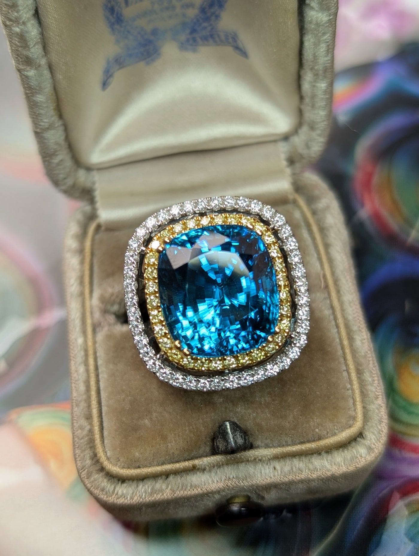 Blue zircon and diamond ring