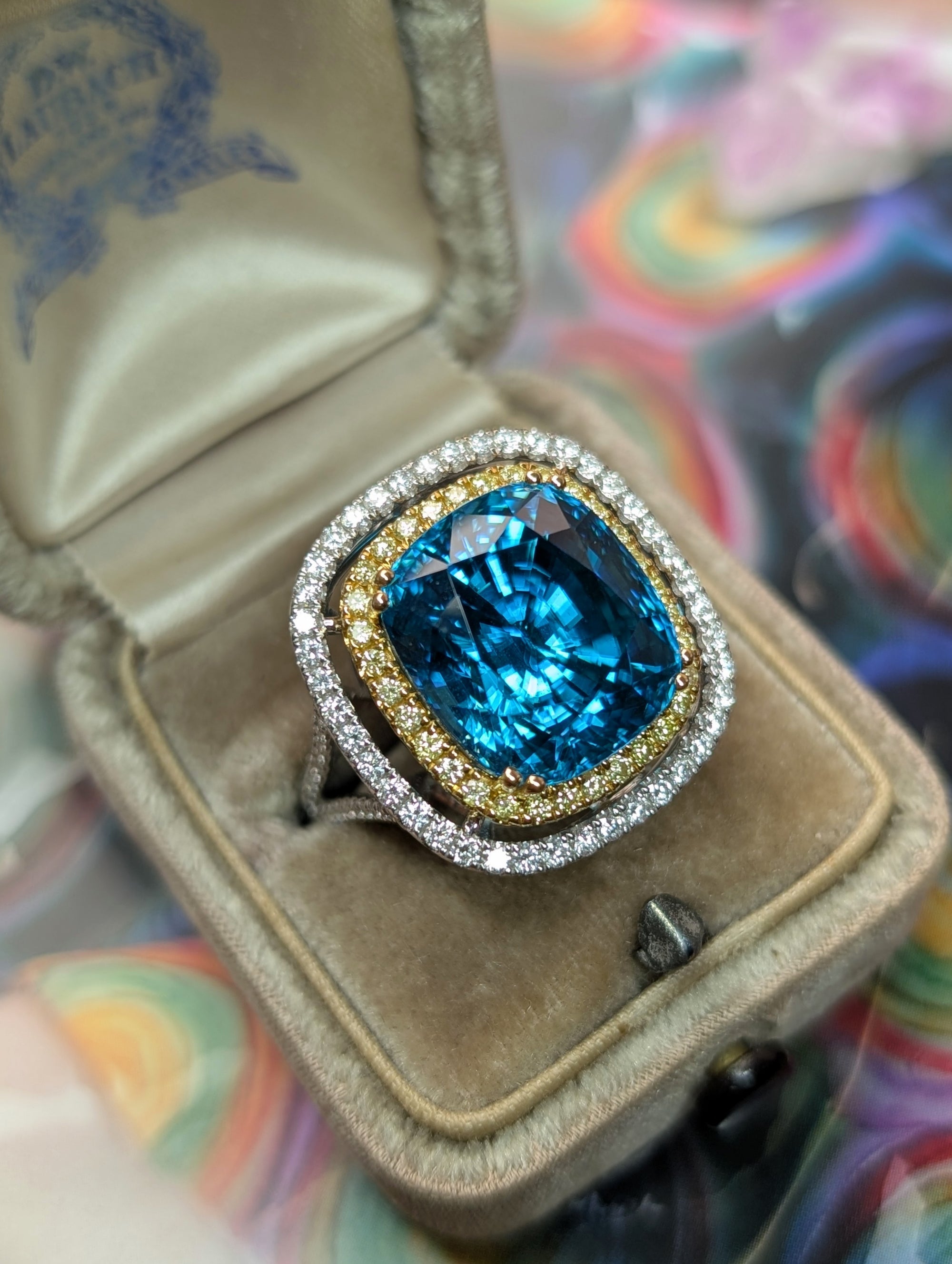 Blue zircon and diamond ring