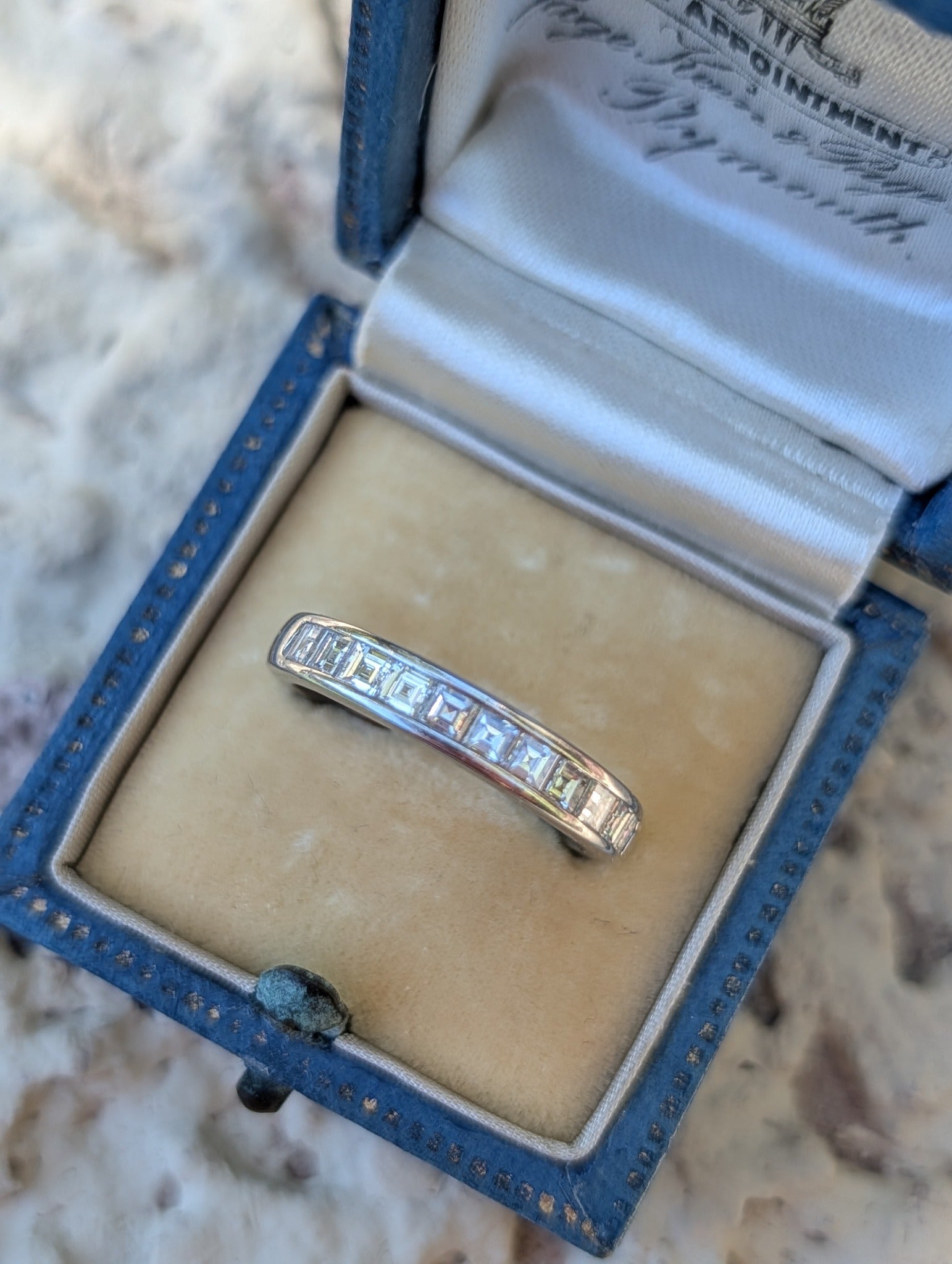 Tiffany & Co. platinum carré-cut diamond half eternity band, front view