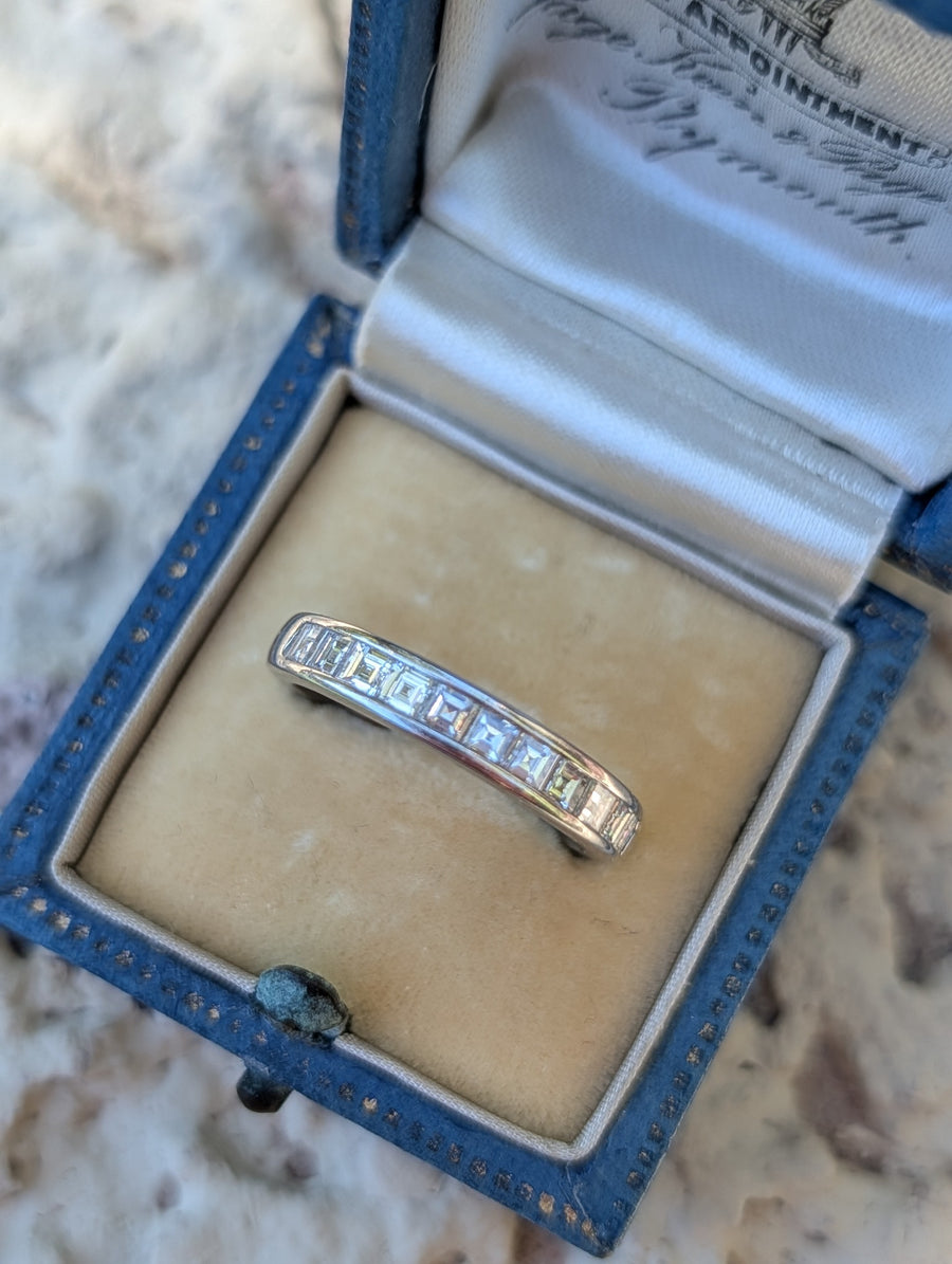 Tiffany & Co. platinum carré-cut diamond half eternity band, front view