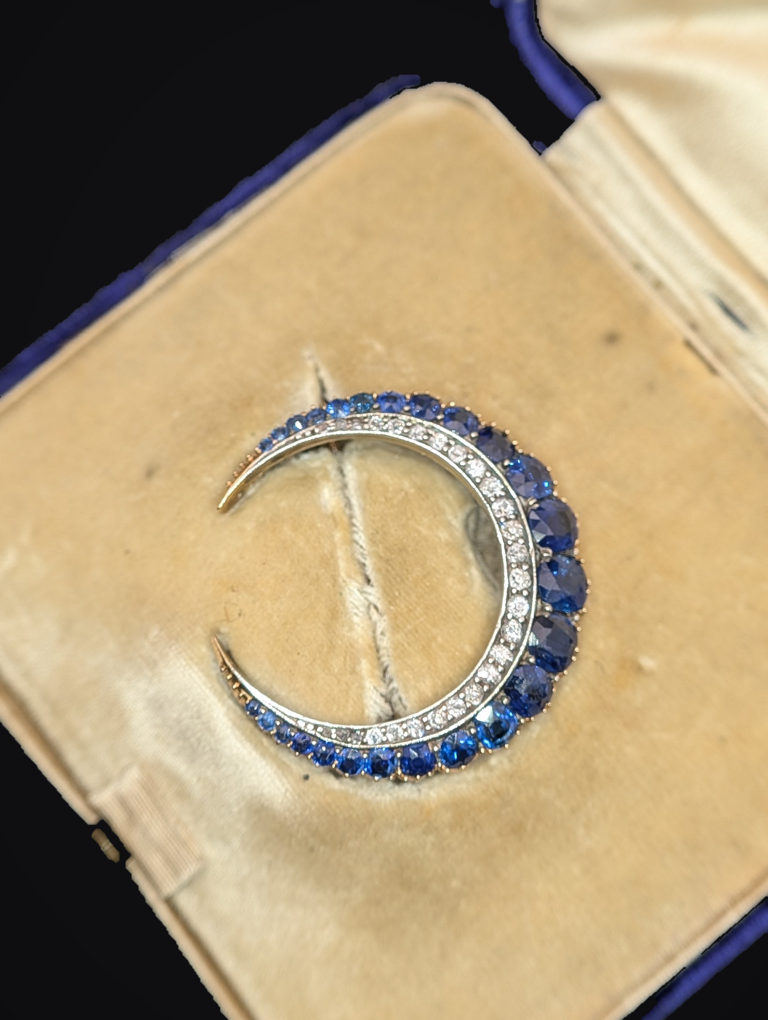 Close view of Victorian sapphire crescent brooch in original box