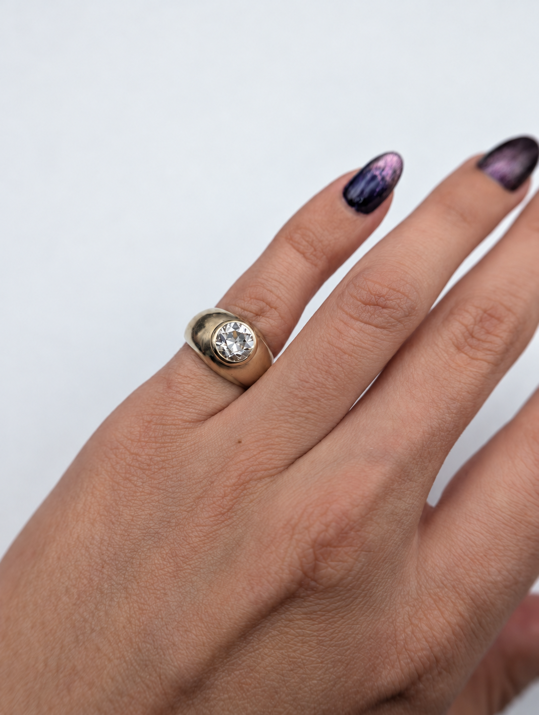 Vintage 18 karat gold bezel ring with old European cut diamond