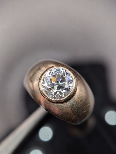 Vintage 18 karat gold bezel ring with old European cut diamond