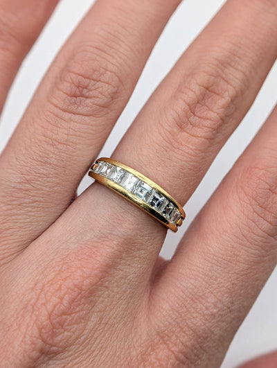 Close view of the Boucheron diamond band worn on the hand