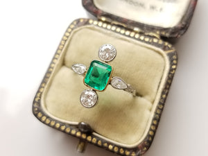 EMERALD AND DIAMOND RING WITH ANTIQUE PEAR CUTS