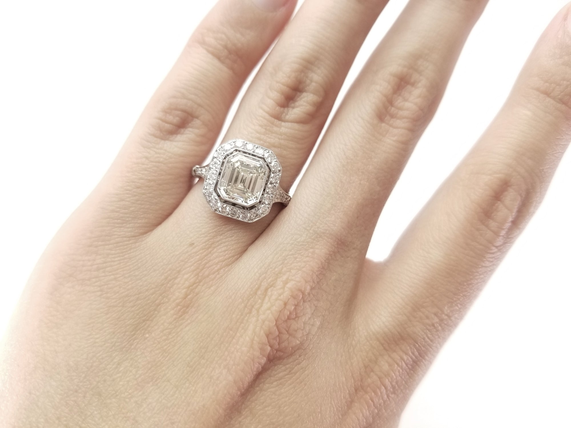 2.61CTW EMERALD CUT DIAMOND RING