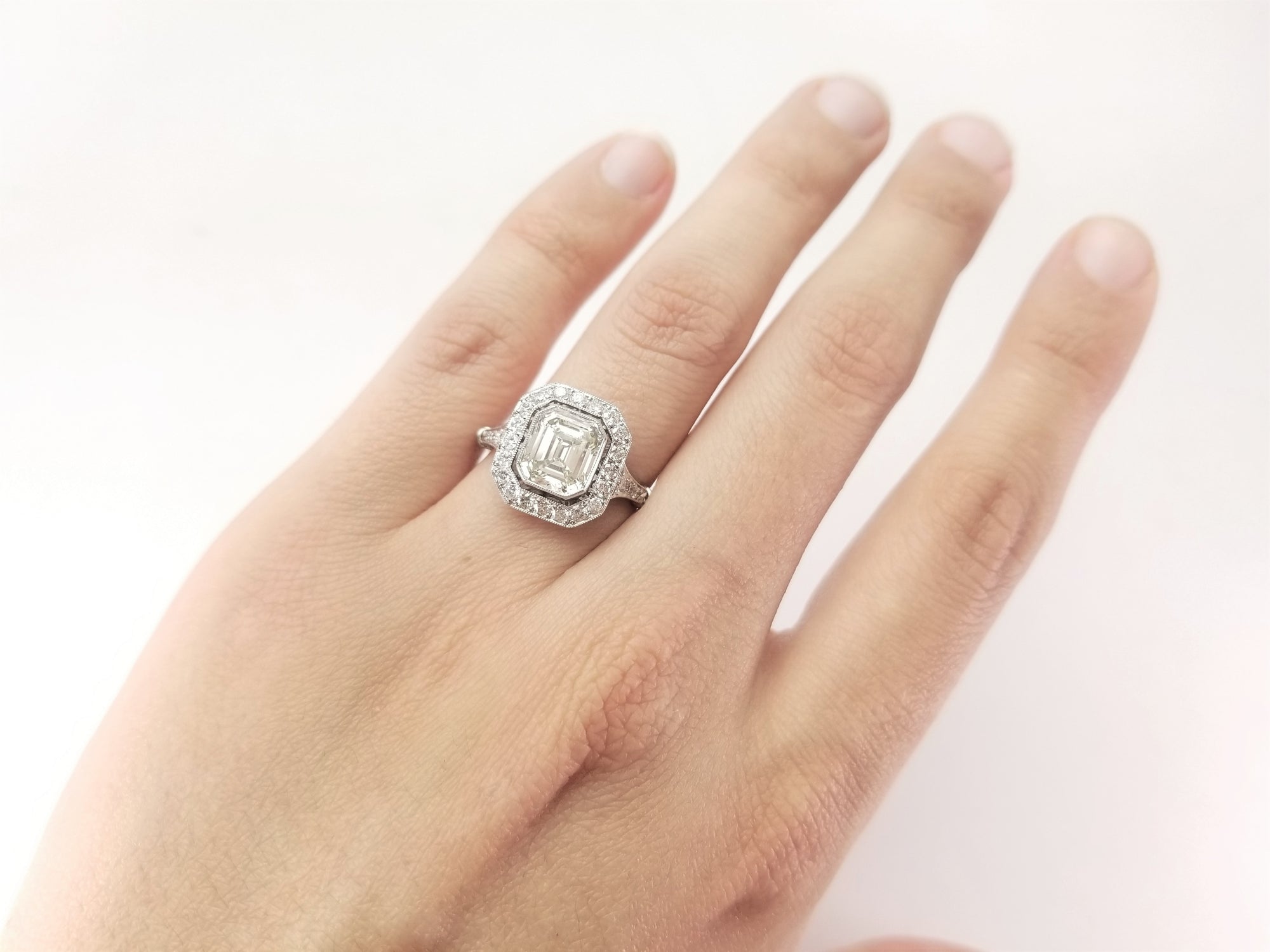 2.61CTW EMERALD CUT DIAMOND RING