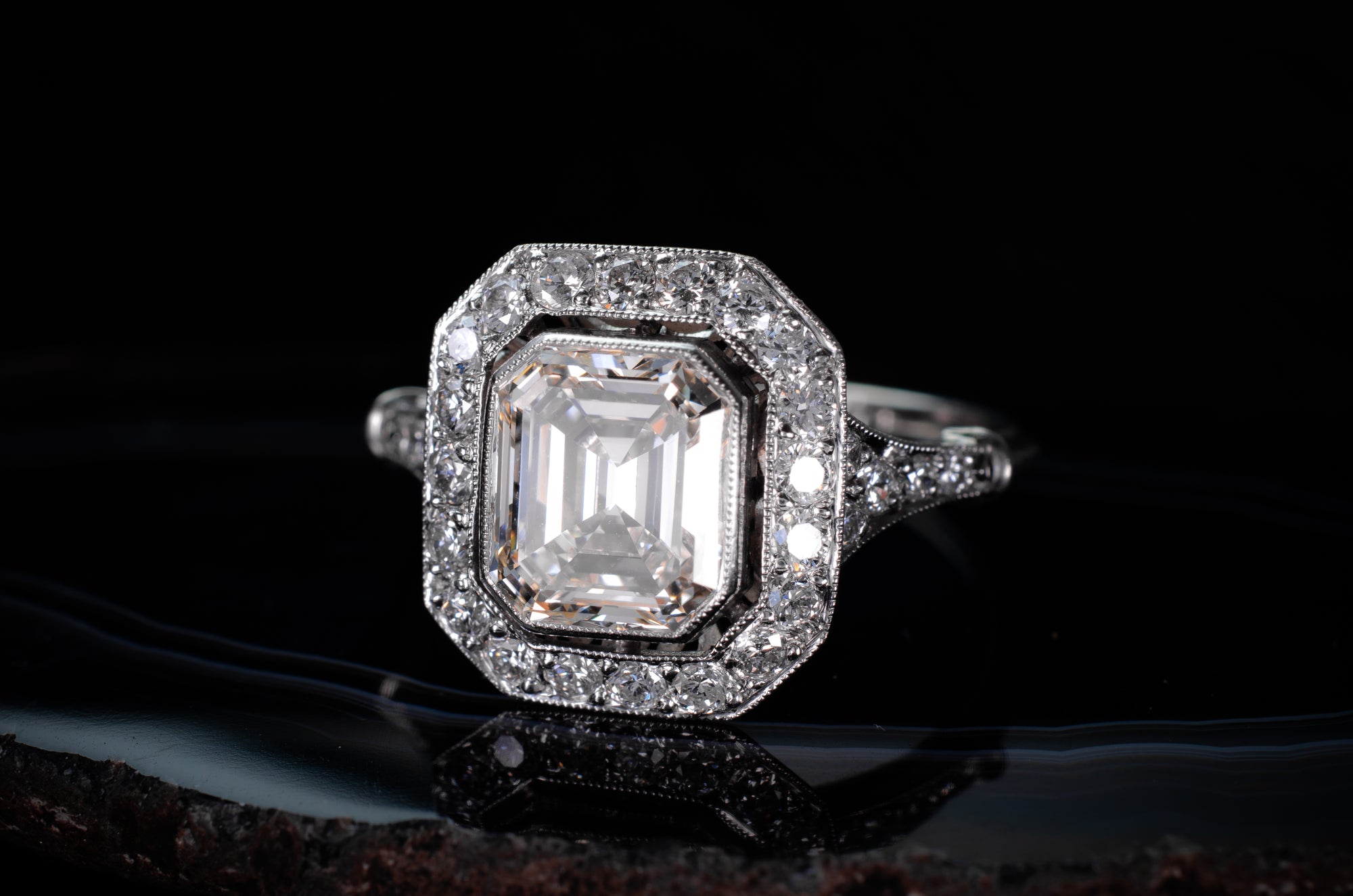 2.61CTW EMERALD CUT DIAMOND RING