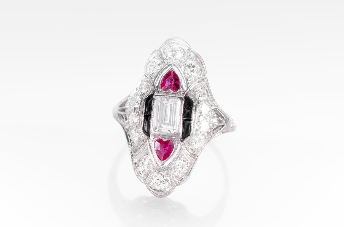 ART DECO RUBY, ONYX AND DIAMOND NAVETTE SHAPED RING