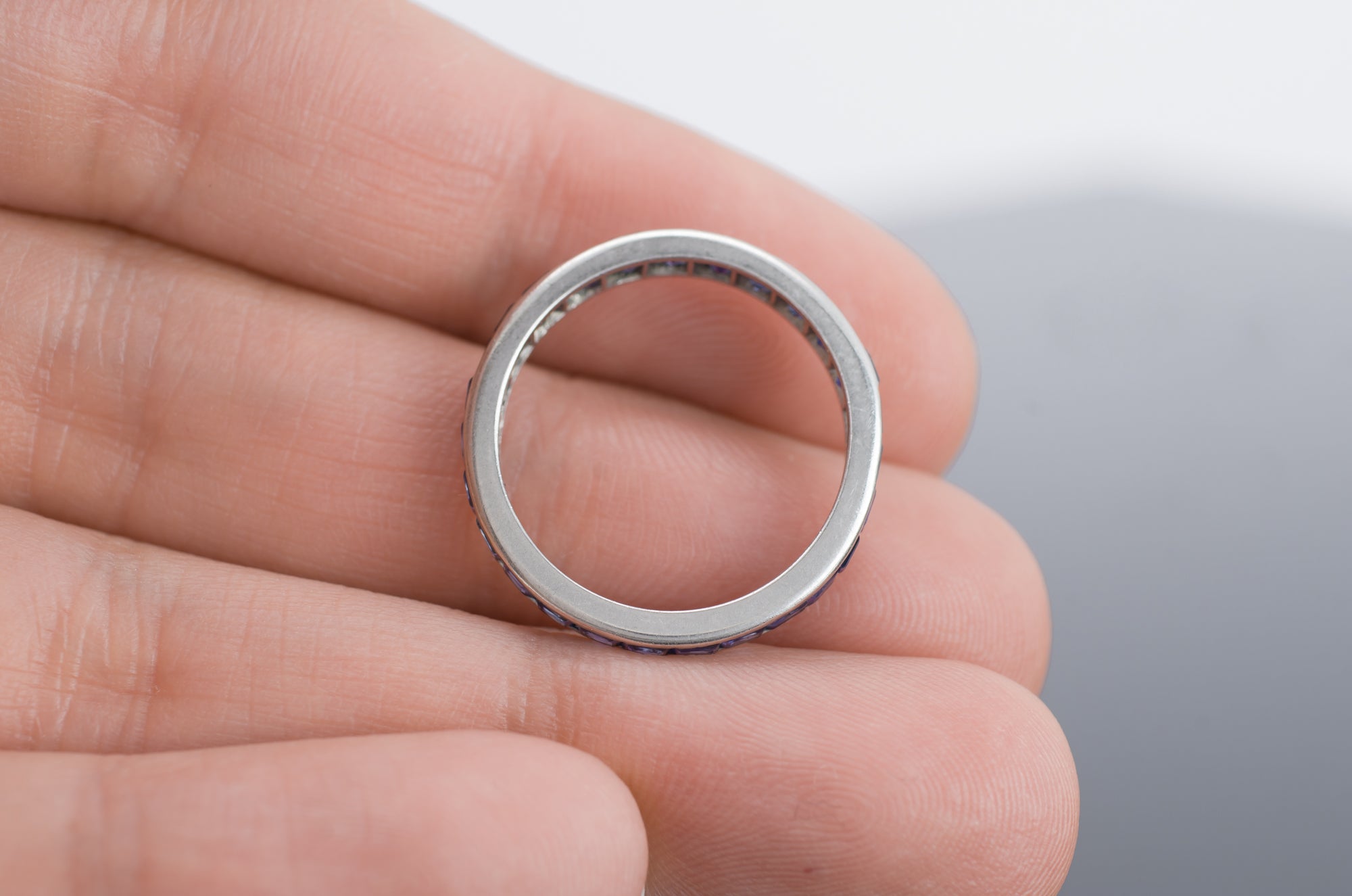 VINTAGE SAPPHIRE ETERNITY RING IN PLATINUM - SinCityFinds Jewelry