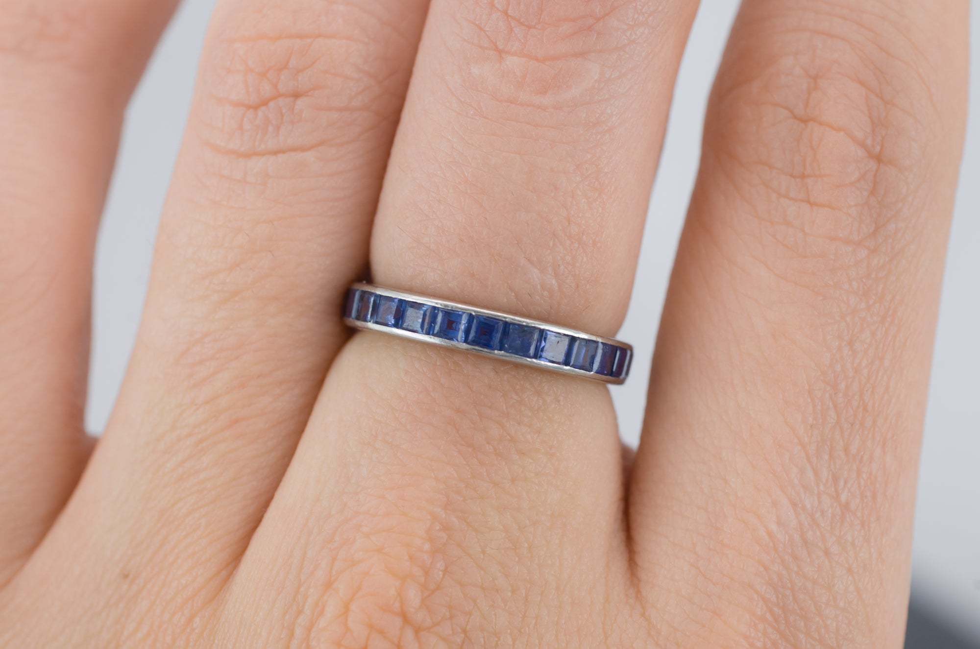 VINTAGE SAPPHIRE ETERNITY RING IN PLATINUM - SinCityFinds Jewelry