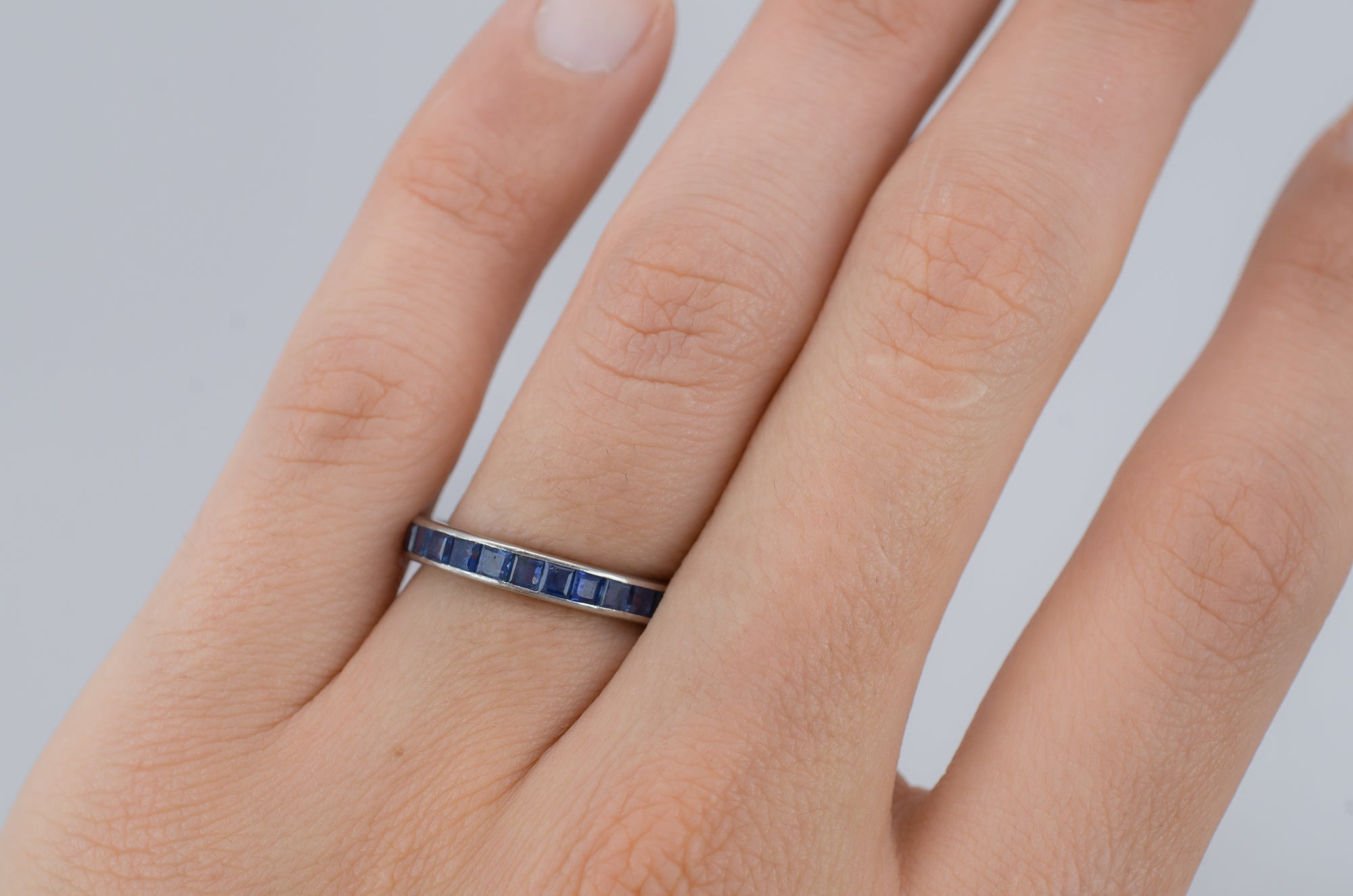 VINTAGE SAPPHIRE ETERNITY RING IN PLATINUM - SinCityFinds Jewelry