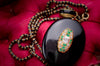ANTIQUE BLACK ENAMEL LOCKET AND DIAMOND WITH EMERALD - SinCityFinds Jewelry